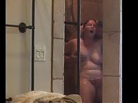 Husband gets his BBW wife off in shower passionately